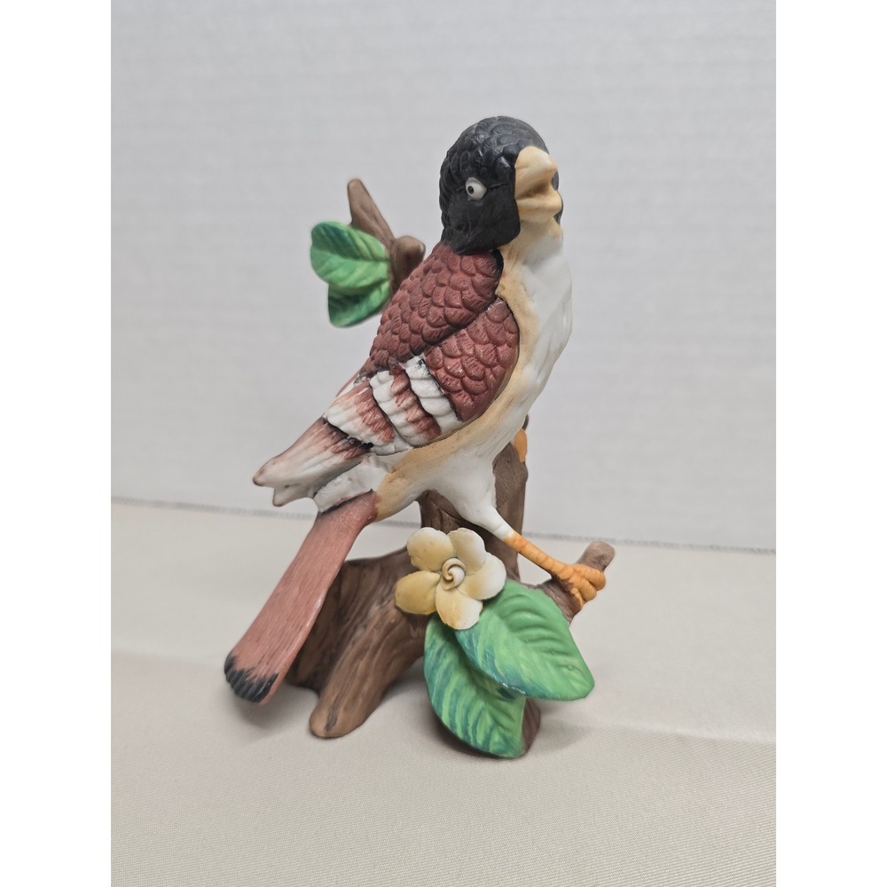 Ceramic Songbird Figurine with Flower Standing on Tree Trunk